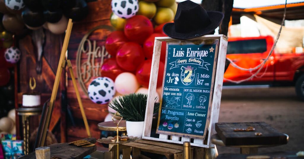 Chalkboard sign at a vibrant harry potter birthday setup with balloons and western theme.